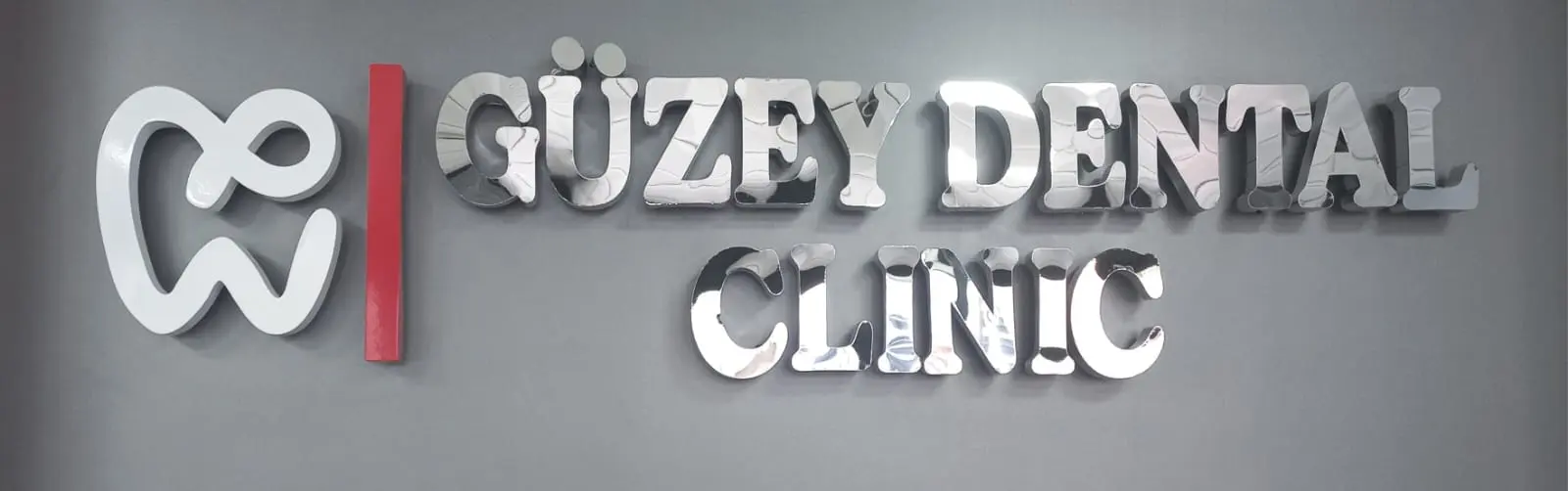 Logo von Güzey Zahnklinik